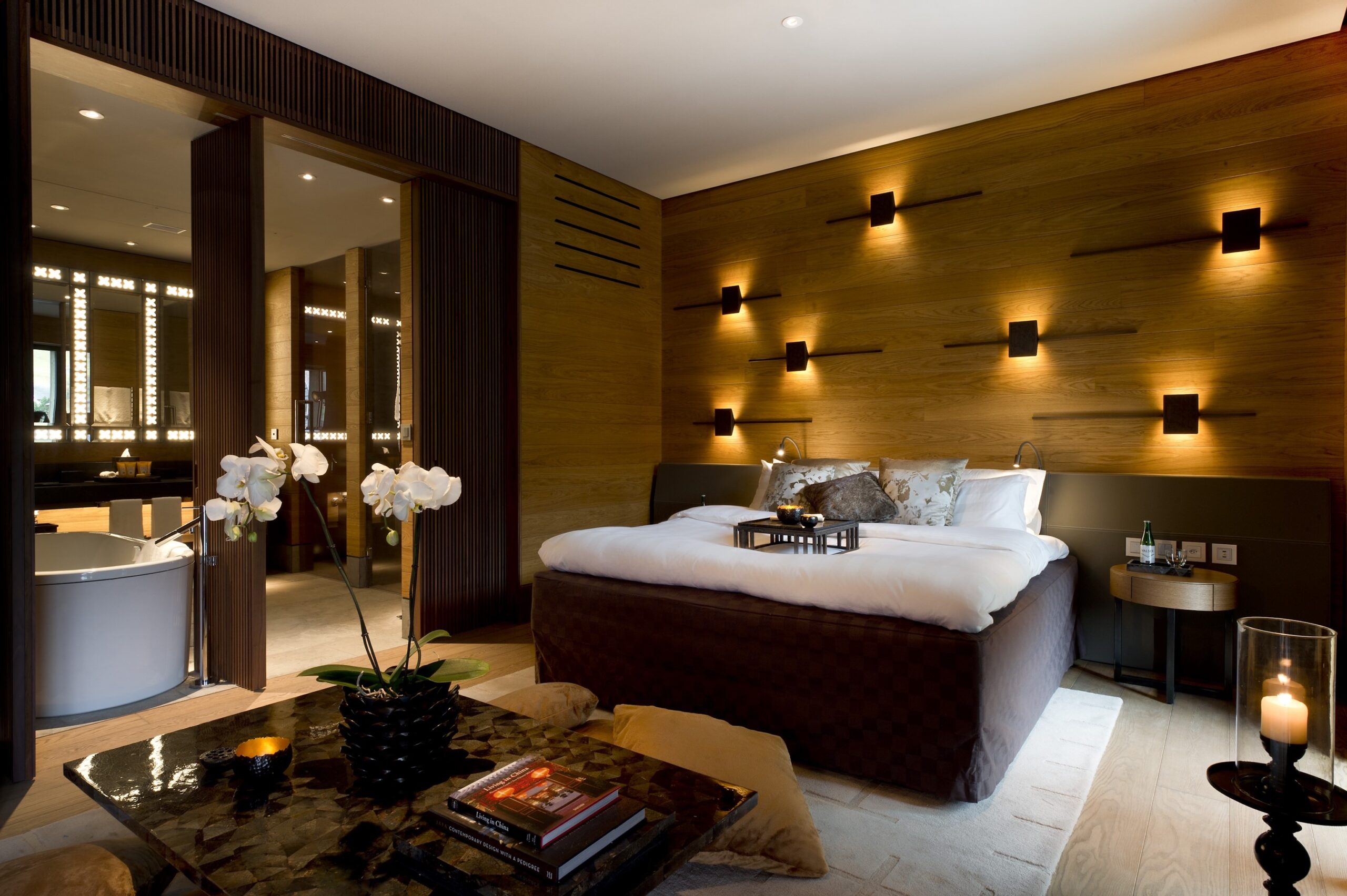 Luxury bedroom interior design at the Chedi Andermatt, one of the best hotels in Switzerland